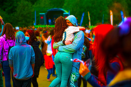 photography of man and woman huggin opn park thumbnail