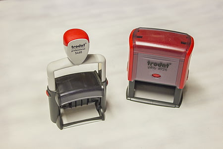 red Trodat stamp on white surface thumbnail