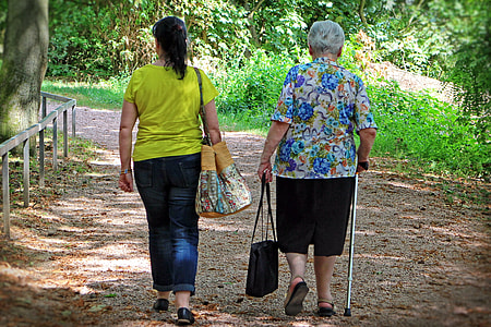 woman walking on road thumbnail