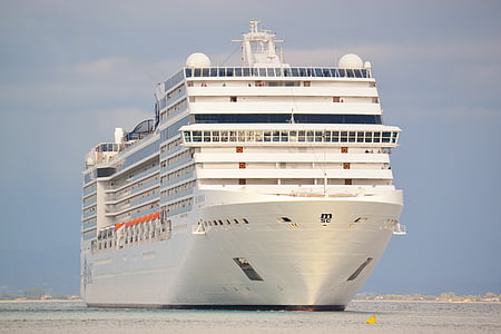 white cruise ship on body of water at daytime thumbnail