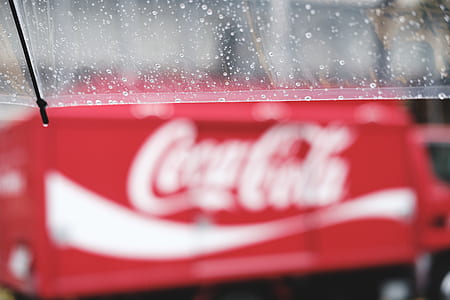 Coca-Cola bottle opener closeup photography thumbnail