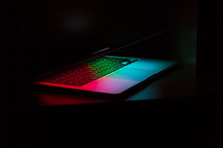 powered on laptop computer on black surface thumbnail