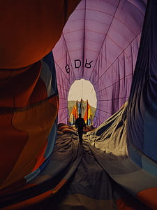 man walking inside an inflatable structure thumbnail