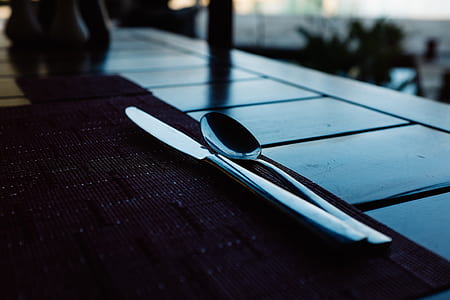 spoon and knife on table thumbnail