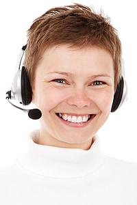 person wearing white top smiling for photo thumbnail