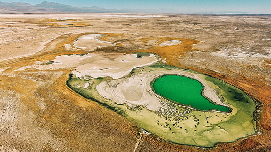 aerial view of body of water between the sand thumbnail