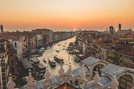 high-angle photo body of water in the middle of establishment with boats thumbnail