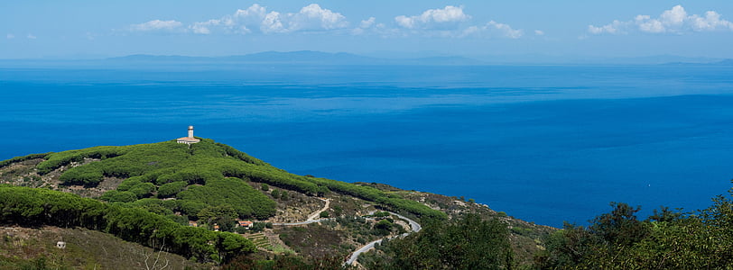 overlooking mountain and body of water thumbnail