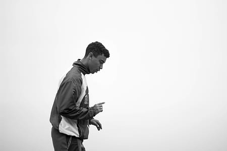 Man Standing Wearing Track Suit thumbnail