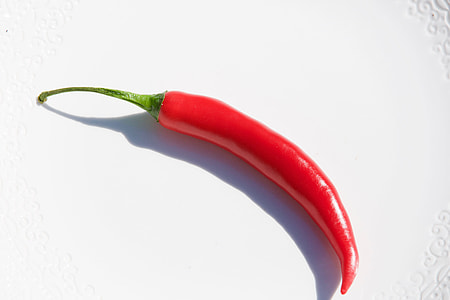 chili on white surface thumbnail