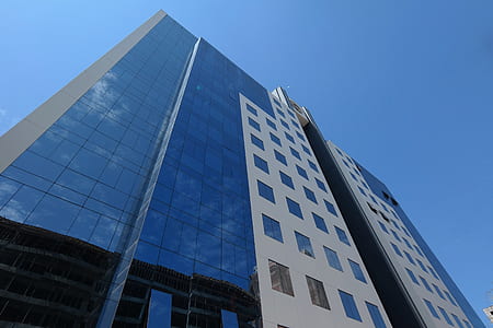 low angle photo of curtain wall at daytime thumbnail