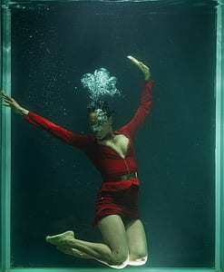 women in red dress on underwater thumbnail