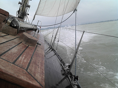 boat on body of water at daytime thumbnail