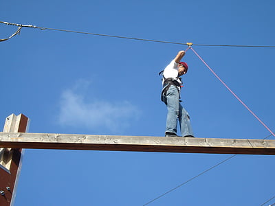 person on brown wooden rack during day time thumbnail