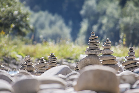 selective focus photography of balanced stones thumbnail