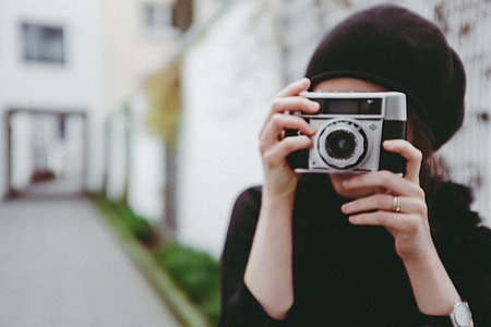 Girl with a vintage camera thumbnail