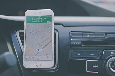 post-2016 iPhone on vehicle's smartphone holder thumbnail