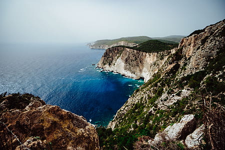 aerial photography of cliff shore thumbnail