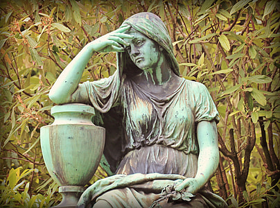 woman right hand on leaning on her forehead statue thumbnail