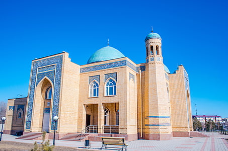 beige concrete mosque at daytime thumbnail