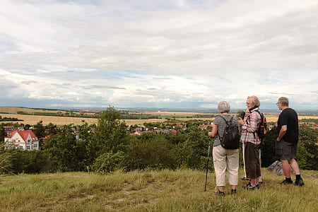 three person facing town thumbnail