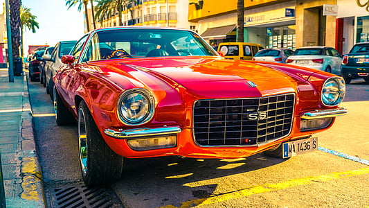 red Chevy Chevelle SS on roadside thumbnail
