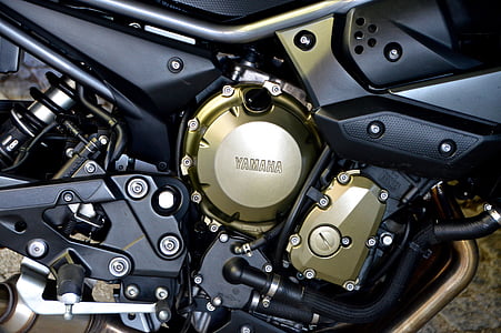 black and brown Yamaha motorcycle engine in close-up photo thumbnail