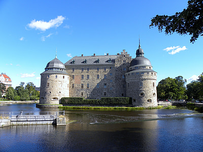 castle surrounded body of water thumbnail