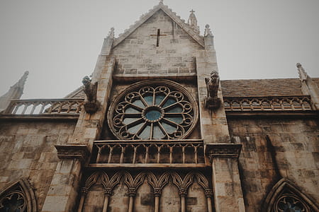 Low-angle Photo of Brown Concrete Cathedral thumbnail