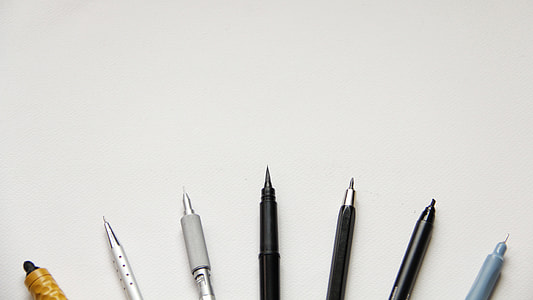 seven assorted-color ball point pens thumbnail