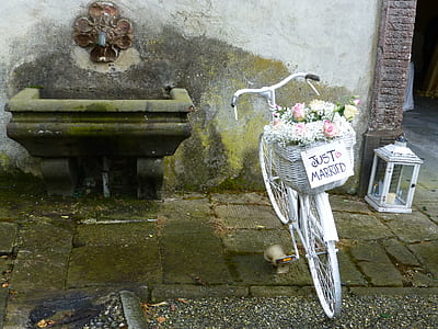 white bike park beside sink thumbnail