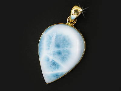 close up photography of frost iced accent pear cut gold bailed pendant thumbnail