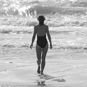 grayscale photography of woman in one piece swimsuit thumbnail