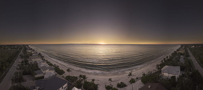 Panoramic Photography of Beach during Golden Hour thumbnail