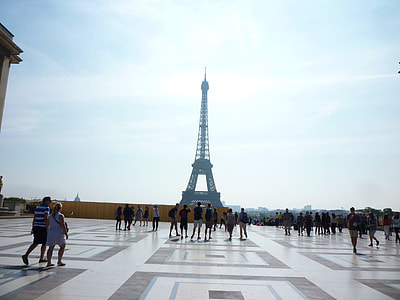 group of people near Eiffel Tower thumbnail
