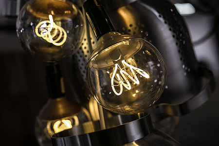 Bright lightbulbs giving warm light thumbnail