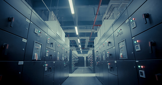 hallway photography surrounded with machines thumbnail