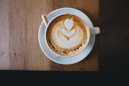 cup of cappuccino on table thumbnail