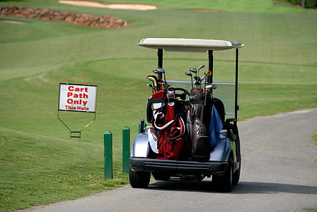 red and black golf bags on cart thumbnail