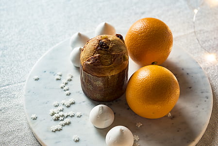 muffin with orange fruit on table thumbnail