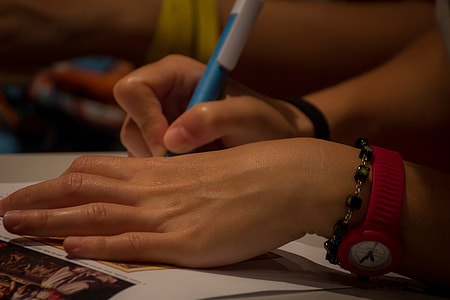 person writing using ball point pen thumbnail