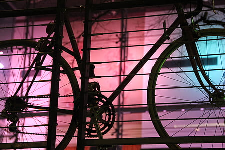 black city bike leaning against black metal handrail thumbnail