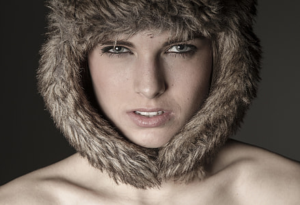 person wearing brown headdress thumbnail