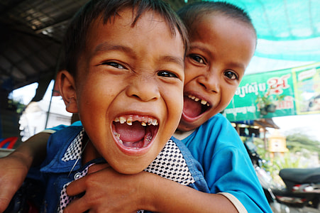 two boys smiling thumbnail