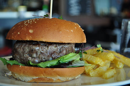 closeup photography of hamburger with potato fries thumbnail