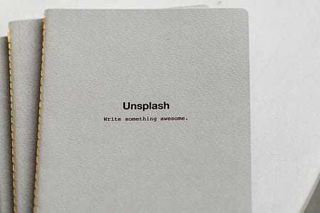 pile of three gray covered Unsplash books thumbnail