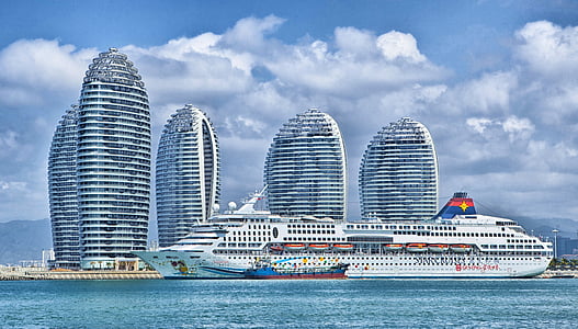 white cruise ship on body of water during daytim thumbnail
