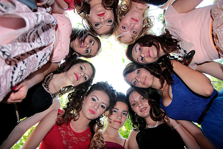 group of women forming circle facing down thumbnail