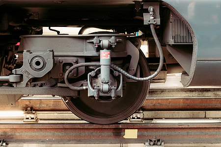 gray and black metal train wheels thumbnail