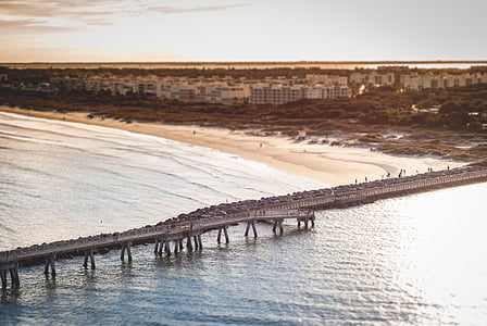gray concrete bridge during day time thumbnail